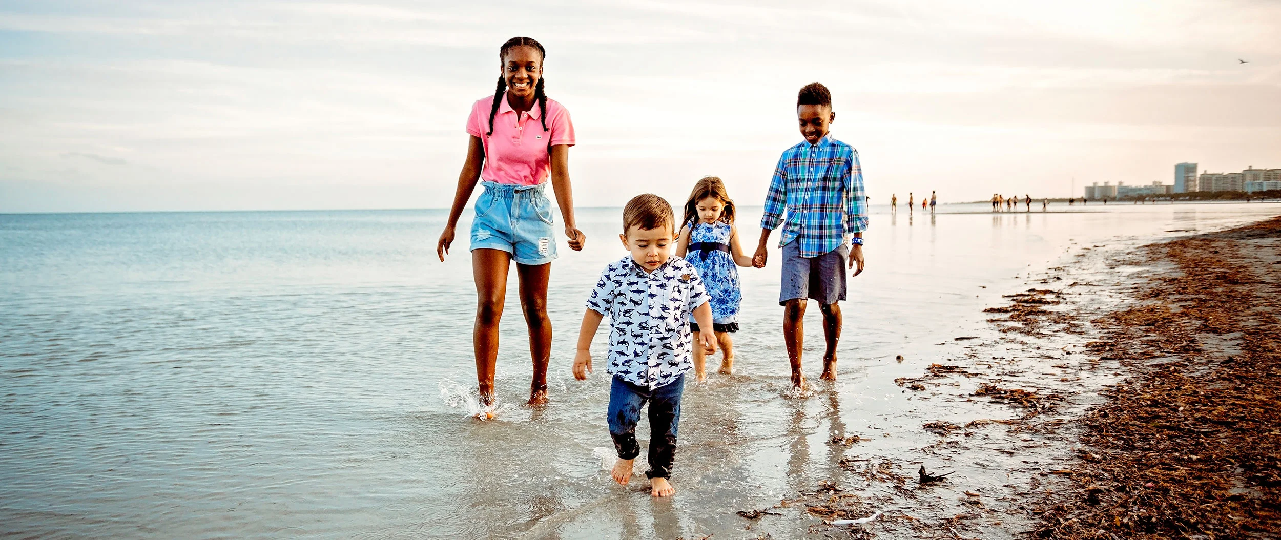 foster kids walking on the shore together
